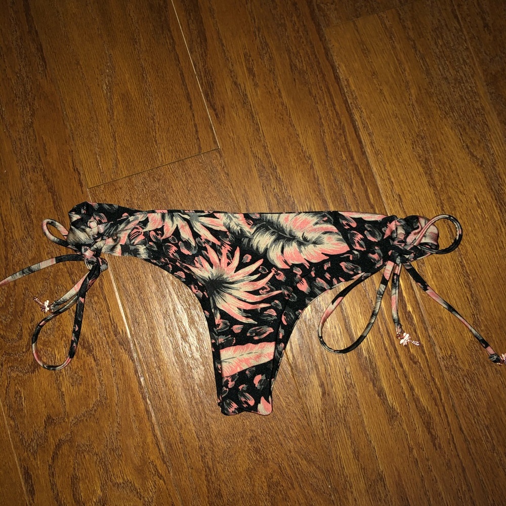 Cheeky reversible floral and animal printed bikini bottoms